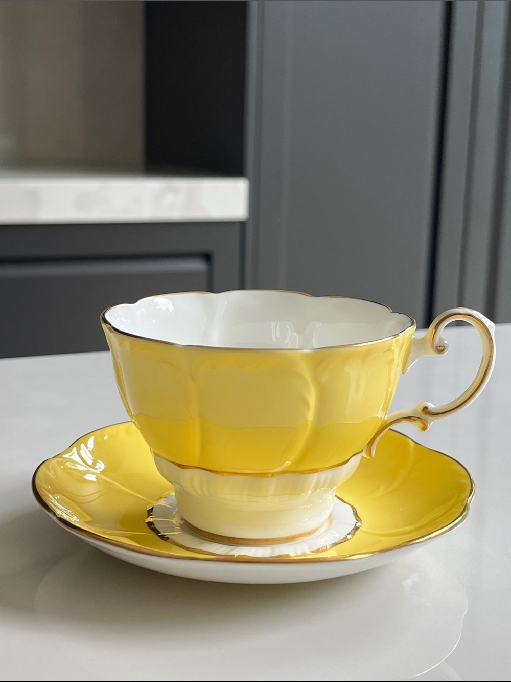 PARAGON Double Warrant Tea Cup and Saucer. Yellow Flower Petal with Gold Gilt.